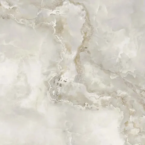 ONYX WHITE — чистый белоснежный полупрозрачный оникс с тонкими кремовыми прожилками, идеально подходит для подсвеченных интерьерных панелей и светлых декоративных решений